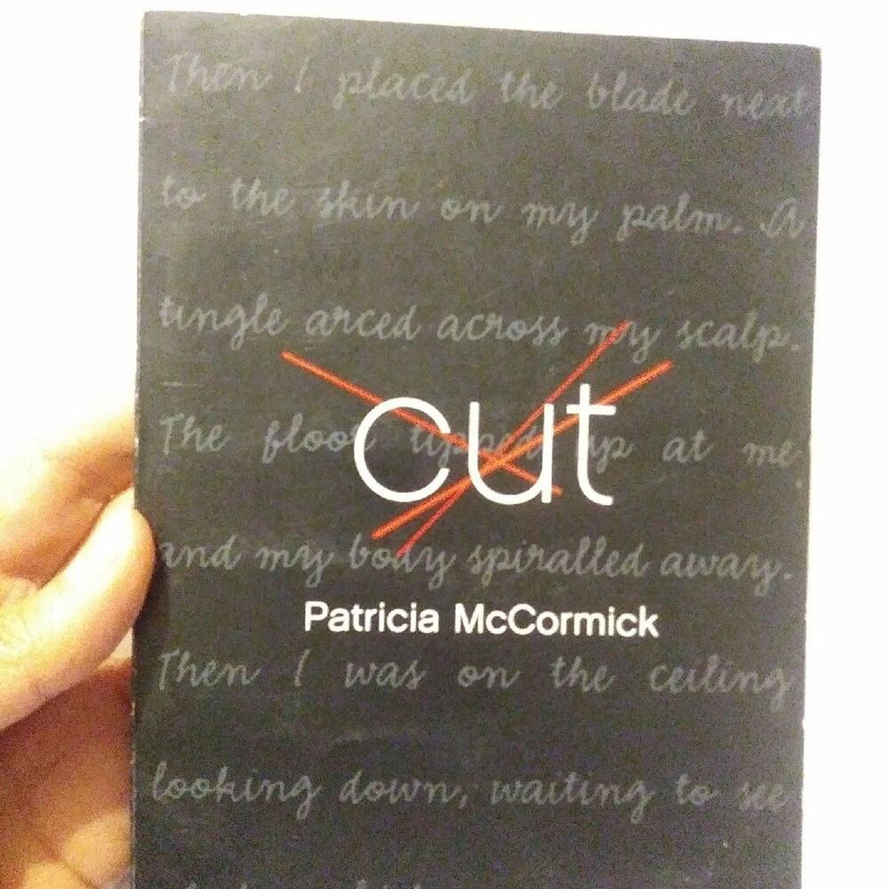 Cut book by Patricia McCormick Trade paperback Good condition